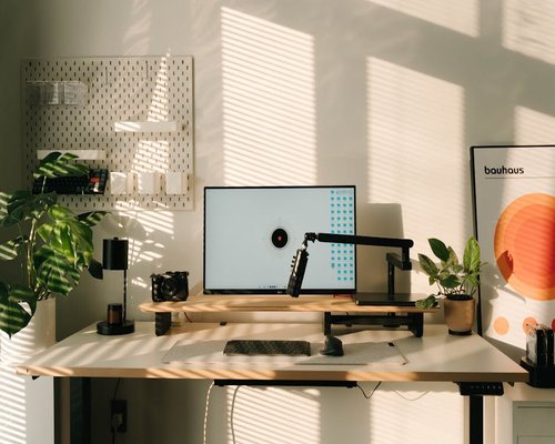 Person doing home office in a well lit room